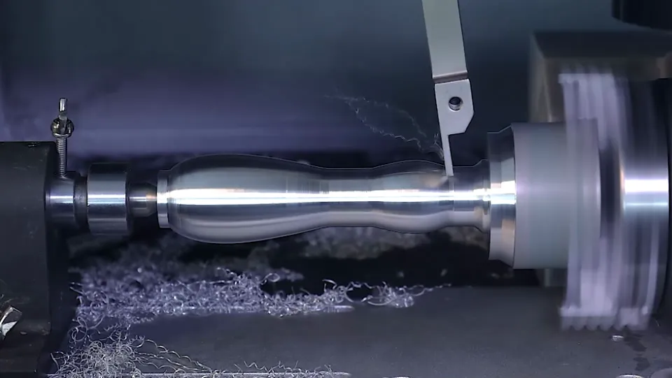 Gweike C1 optional turning module cutting an aluminium shaft